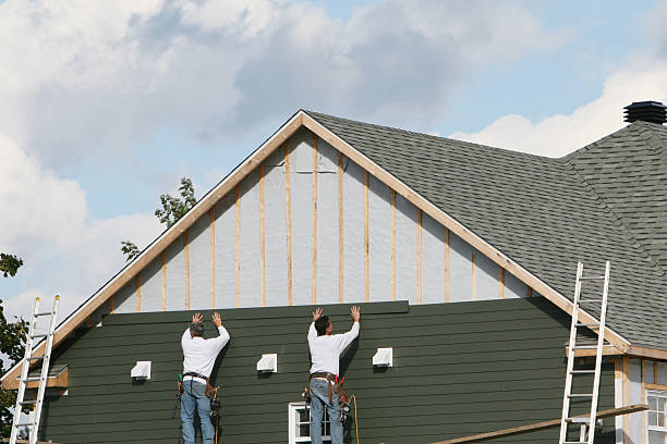 Professional Siding Repair technician working in Takoma Park, MD